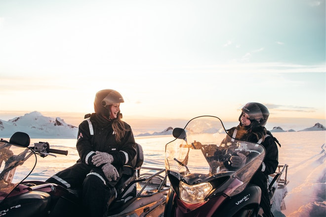 Midnight Sun & Snowmobiling from Husafell